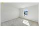 Bright bedroom with neutral carpet and paint, offering a simple, yet elegant interior space at 1426 Cooper St, Sanford, NC 27330