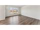 This bedroom features plenty of natural light and neutral finishes at 1426 Cooper St, Sanford, NC 27330