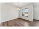 Dining area with stylish chandelier lighting and views of the outdoors at 1426 Cooper St, Sanford, NC 27330