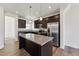 Modern kitchen featuring stainless steel appliances, granite countertops, and ample cabinetry at 1426 Cooper St, Sanford, NC 27330