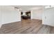 Bright living room featuring modern floors, neutral walls, and an open layout at 1426 Cooper St, Sanford, NC 27330