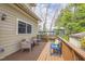 Back deck featuring a blue bench and seating with a wooden railing and view at 1426 N Roxboro St, Durham, NC 27701