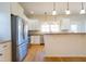 Well-appointed kitchen with stainless steel appliances and ample storage space for modern convenience at 1426 N Roxboro St, Durham, NC 27701