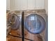 Convenient laundry room featuring front loading washer and dryer at 1426 N Roxboro St, Durham, NC 27701