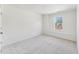 Bright, unfurnished bedroom with natural light and neutral carpeting, perfect for personalization at 1430 Cooper St, Sanford, NC 27330