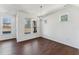 Light-filled dining area boasting hardwood floors and modern light fixture at 1432 Cooper St, Sanford, NC 27330