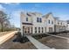 Charming two-story home featuring a covered porch and beautifully landscaped front yard at 1432 Cooper St, Sanford, NC 27330
