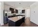 Contemporary kitchen boasting stainless steel appliances and a large center island at 1432 Cooper St, Sanford, NC 27330