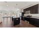 Stylish kitchen offers stainless steel appliances, granite counters, and open layout at 1432 Cooper St, Sanford, NC 27330