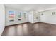 Bright living room featuring large windows and contemporary finishes at 1432 Cooper St, Sanford, NC 27330