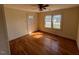 Bedroom featuring hardwood flooring, natural light from windows and door at 148 Baptist Church Rd, Henderson, NC 27537