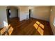 Inviting living room with a fireplace and gleaming hardwood flooring at 148 Baptist Church Rd, Henderson, NC 27537