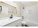 Modern bathroom featuring white marble-style shower tiles and a sleek vanity with black fixtures at 149 Amber Rd, Timberlake, NC 27583