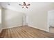 Spacious bedroom with wood-look flooring and ensuite bathroom at 149 Amber Rd, Timberlake, NC 27583