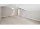 Spacious bonus room with plush carpeting and a neutral color palette, offering versatile living space at 149 Amber Rd, Timberlake, NC 27583