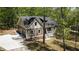 Charming exterior of home with well-maintained lawn, landscaping, and paved drive at 149 Amber Rd, Timberlake, NC 27583