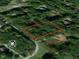 Aerial view of the property line outlined in red on a wooded lot at 149 Amber Rd, Timberlake, NC 27583