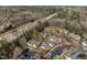 An aerial view shows the community with a backdrop of lush trees and a nearby highway at 1613 Bulon Dr, Cary, NC 27518