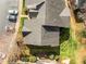 An aerial view shows the roof and parking lot for this residential community at 1613 Bulon Dr, Cary, NC 27518