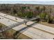 This unique aerial view showcases the pedestrian bridge over the highway at 1613 Bulon Dr, Cary, NC 27518
