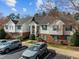 Exterior of a well-kept apartment complex with parking and green spaces at 1613 Bulon Dr, Cary, NC 27518