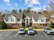 Attractive townhouse complex featuring ample parking and beautiful landscaping at 1613 Bulon Dr, Cary, NC 27518