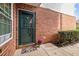 Charming front door with brick accents and a welcoming entrance at 1613 Bulon Dr, Cary, NC 27518