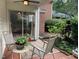 Charming patio with outdoor seating, lush greenery, and a cozy ambiance for relaxing or entertaining at 1613 Bulon Dr, Cary, NC 27518