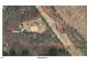 Aerial view of land featuring a home and training area at 195 Falcon Ln, Rougemont, NC 27572