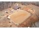 Areal shot of horse property featuring a large riding area and stable at 195 Falcon Ln, Rougemont, NC 27572