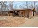 Barn for equipment storage and hay bale storage featuring an American flag at 195 Falcon Ln, Rougemont, NC 27572