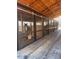 Inside the horse barn featuring individual stalls, each equipped with its own gate at 195 Falcon Ln, Rougemont, NC 27572