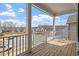 Covered balcony providing an outdoor space overlooking the neighborhood, with ample room for seating at 204 Cassada Ct, Holly Springs, NC 27540