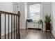 Bright hallway nook with bench seating, storage, and a window view, adding a touch of charm at 204 Cassada Ct, Holly Springs, NC 27540