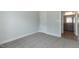 Bedroom with plush carpet and view to an adjacent bathroom with modern finishes at 210 Cason Dr, Gibsonville, NC 27249