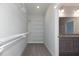 Spacious walk-in closet with wire shelving and carpet flooring, perfect for storage and organization at 210 Cason Dr, Gibsonville, NC 27249