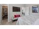 Bedroom contains decorative throw pillows and blankets, a painting, and a bookshelf full of movies at 228 Sacred Fire Rd, Louisburg, NC 27549