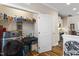 Bright laundry room with front loading dryer and plenty of storage space at 228 Sacred Fire Rd, Louisburg, NC 27549