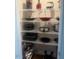 Organized kitchen pantry with cookware and countertop appliances at 228 Sacred Fire Rd, Louisburg, NC 27549