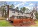 Spacious backyard featuring a wooden deck perfect for outdoor gatherings and relaxation at 3101 Rutledge Ct, Raleigh, NC 27613