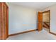 Spacious bedroom features closet and doorway, neutral walls and carpet at 3101 Rutledge Ct, Raleigh, NC 27613