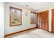 Bright bedroom with natural light and hardwood trim including a wall of closet space at 3101 Rutledge Ct, Raleigh, NC 27613