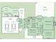 Detailed floor plan showcasing the layout of the first floor and in-law suite with garage and outdoor deck at 3101 Rutledge Ct, Raleigh, NC 27613
