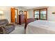 Main bedroom featuring wood furniture, natural light, and calming color scheme at 3101 Rutledge Ct, Raleigh, NC 27613