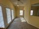Bedroom with ceiling fan, carpet, and access to a balcony at 316 Arbor Greene Dr, Garner, NC 27529