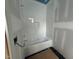 New bathroom featuring white subway tile, new bathtub with built-in niche, ready for finishing touches at 3405 Makers Circle, Raleigh, NC 27612