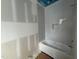 Stylish bathroom features a new tub with white herringbone tile surround and built-in niche at 3405 Makers Circle, Raleigh, NC 27612