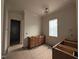 Bathroom featuring wood cabinetry and a bright window at 3405 Makers Circle, Raleigh, NC 27612