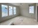 Bedroom featuring large windows with an abundance of natural light at 3405 Makers Circle, Raleigh, NC 27612