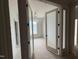 Bright bedroom with frosted double doors and a modern light fixture at 3405 Makers Circle, Raleigh, NC 27612